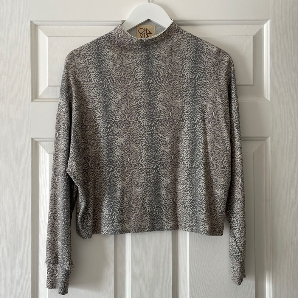 Animal print turtleneck top